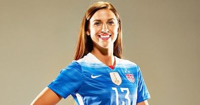 Alex Morgan in a blue U.S. national team jersey