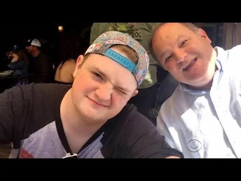 CBS Evening News report: family photo of a teenage boy and a man smiling together